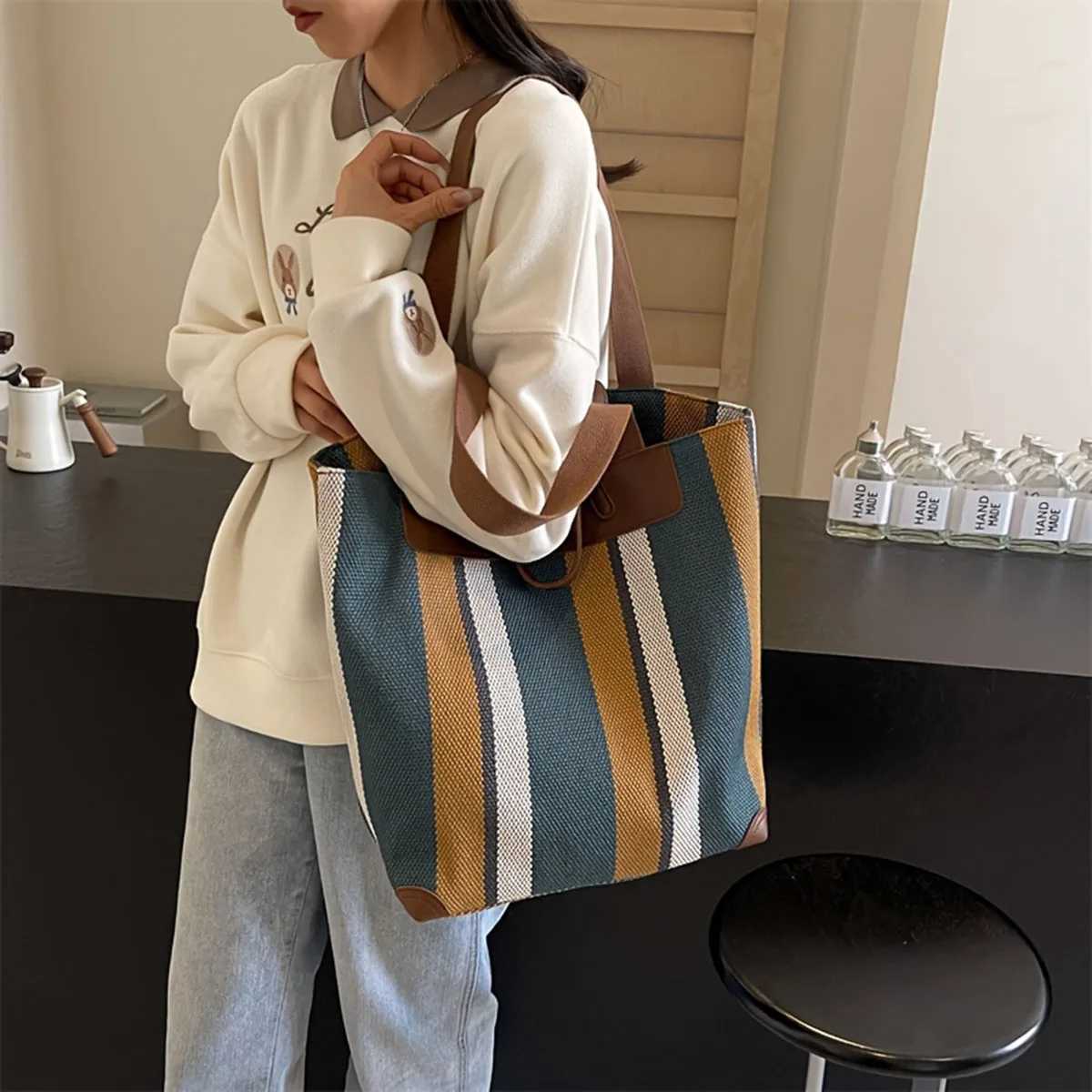Largecapacity colorblocked womens commuter bag multifunctional fashionable striped casual canvas handheld shoulder bagT251007