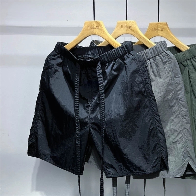 Men Sports Shorts Thin Quick Dry Breathable Casual Classic Resistant Shorts Pants Drawstring Beach Cargo Shorts Men Clothing 240409
