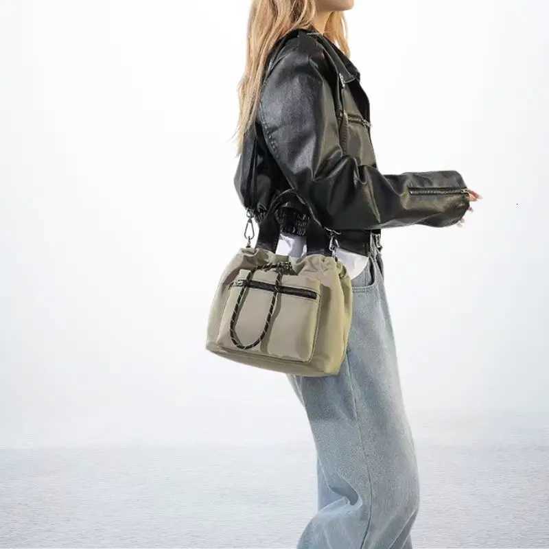 New Womens Crossbody Handbag Simple and Lightweight Drawstring Pocket Shoulder Bag Casual Nylon Fabric Bucket Bag fashionableT251007