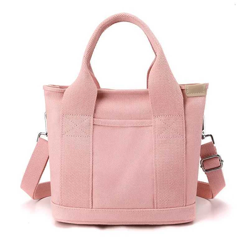 HighEnd Canvas Bento Box Handbag Womens Handheld Bag Soft Fabric Fashionable Design with Phone Pocket And Zipper ClosureT251007