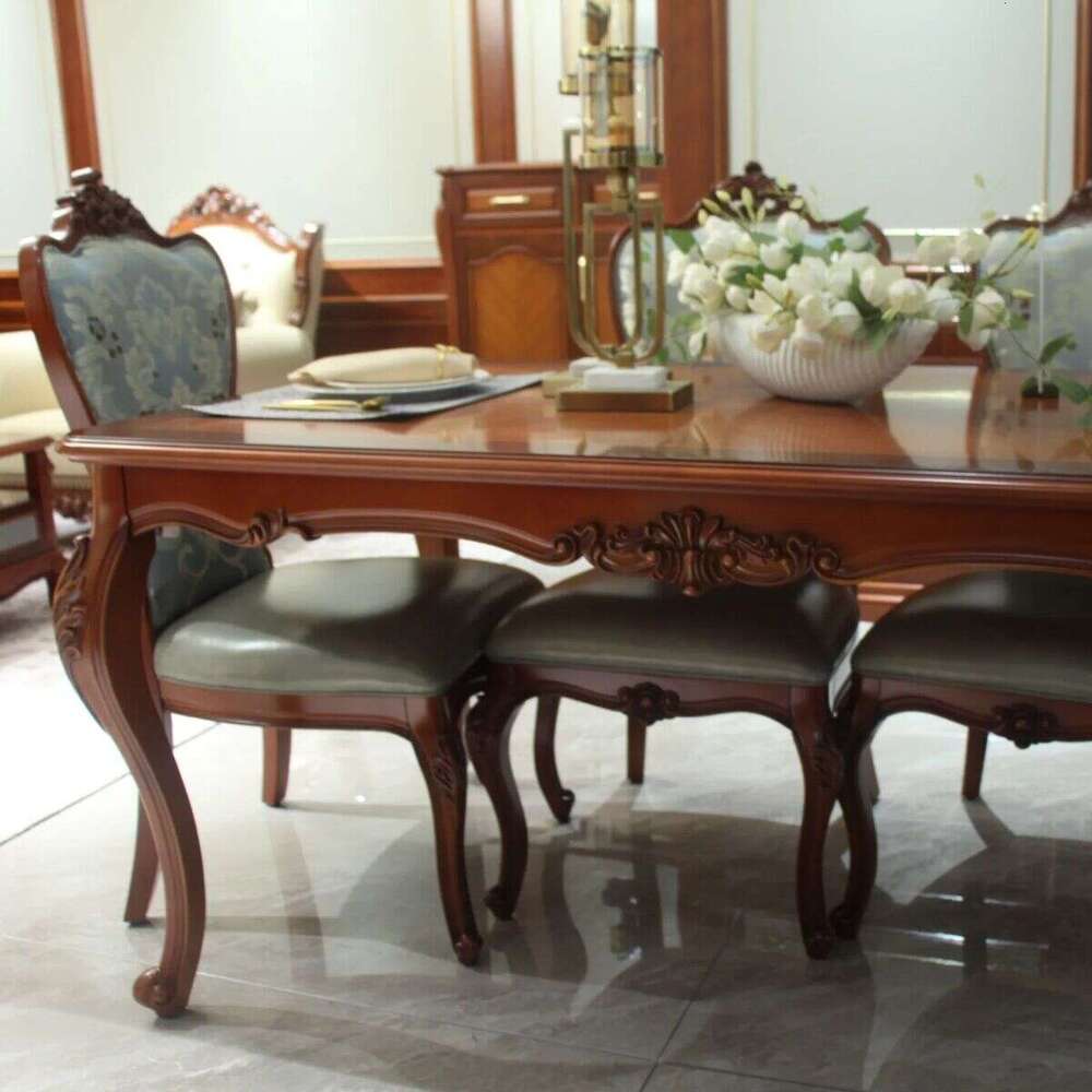 Zhong zhixin The dining table features a European luxury high-end design, meticulously crafted from solid wood.