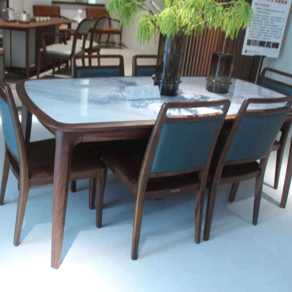 Zhong zhixin High-end design 2025 New The modern dining table is meticulously crafted from solid wood and marble