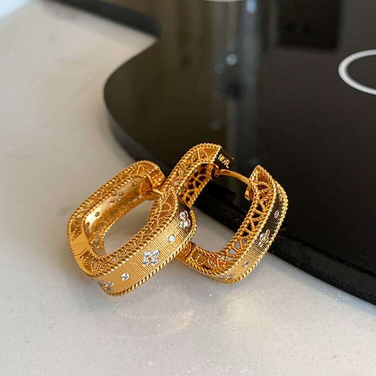 Earrings Designer Luxury jewelry for women earring Four leaf clover hollow pattern copper plated 18K gold Simple Fashion Festival Vacation gifts