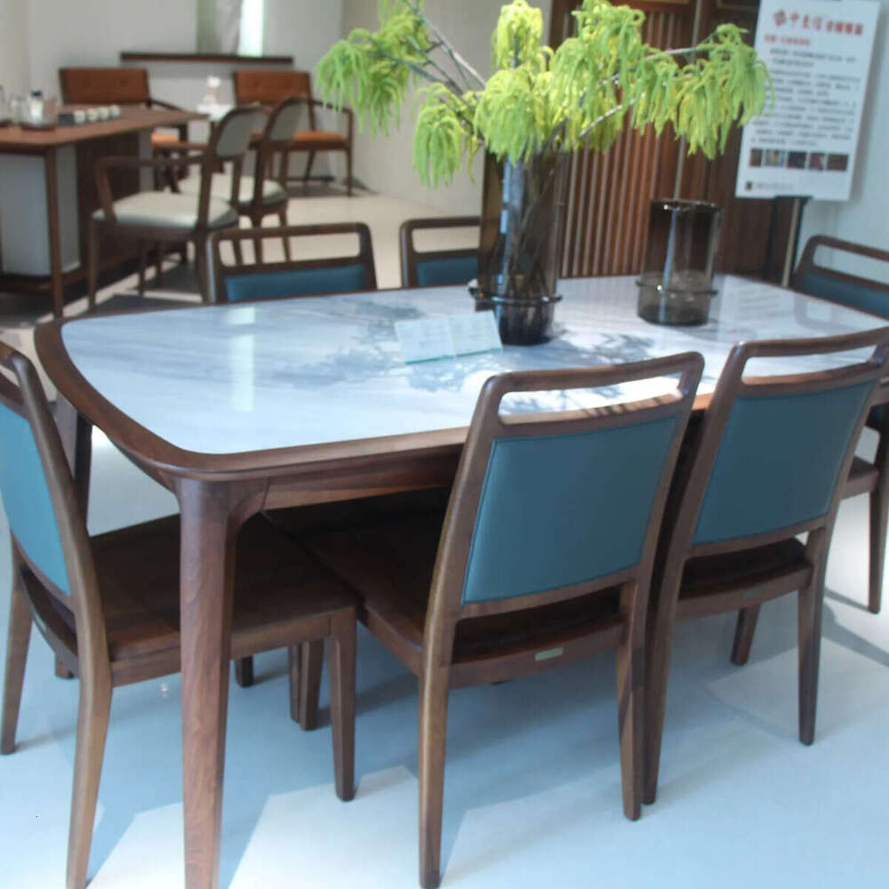 Zhong zhixin High-end design 2025 New The modern dining table is meticulously crafted from solid wood and marble
