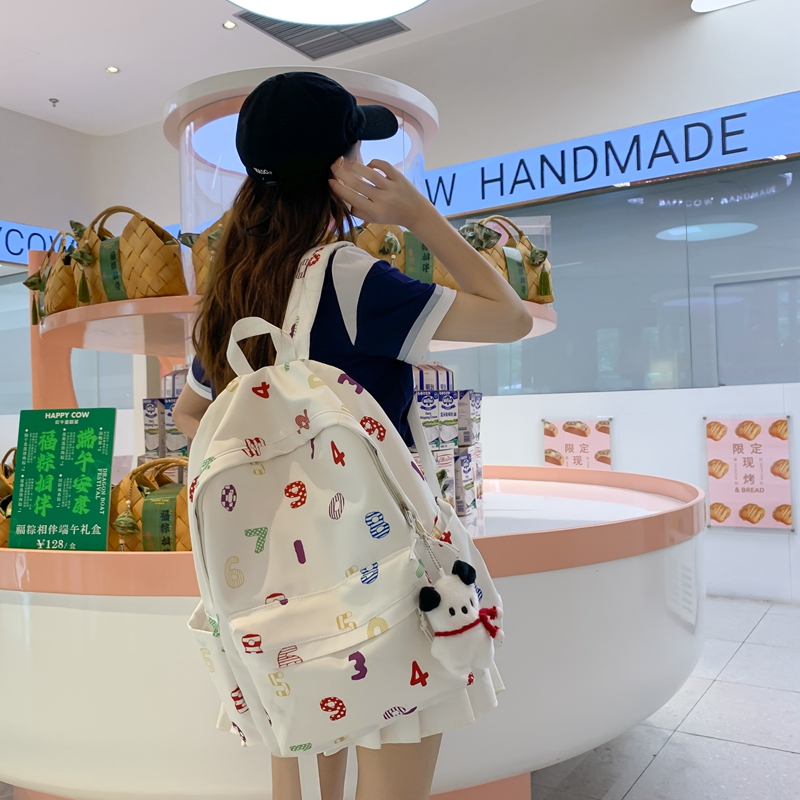 Schoolbag female high school college student junior high school campus Korean niche easy-matching ins canvas contrast color stripe backpack