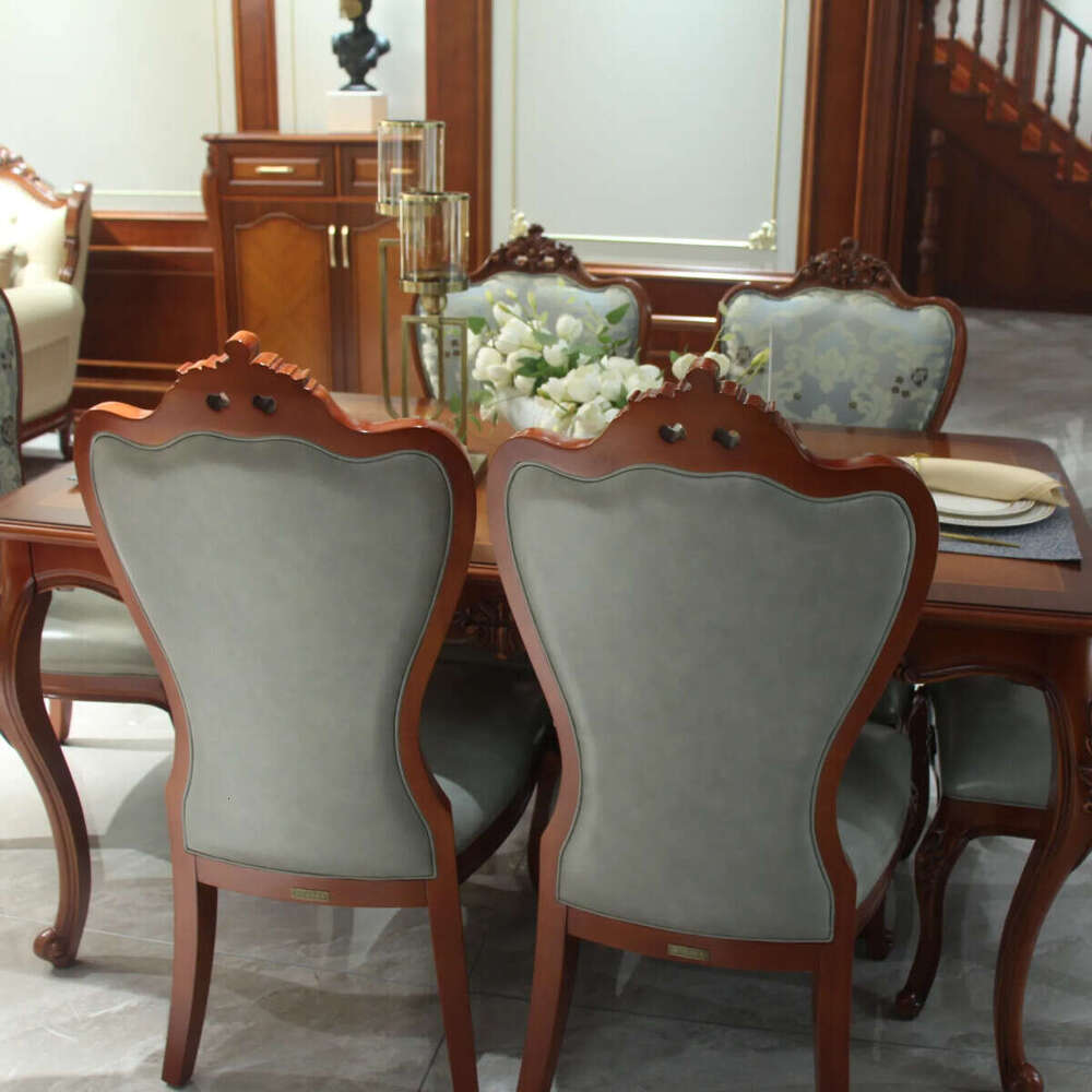 Zhong zhixin The dining table features a European luxury high-end design, meticulously crafted from solid wood.