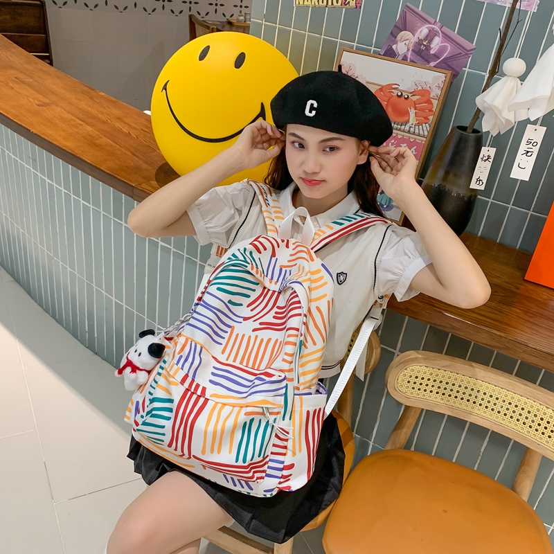 Schoolbag female high school college student junior high school campus Korean niche easy-matching ins canvas contrast color stripe backpack