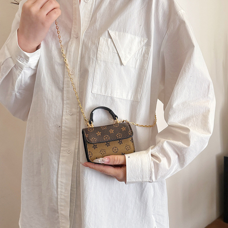 2025 New Mini Bag Light designer bag Luxury Portable Shoulder Handbag Lipstick Bag Travel Chain PU Luxury bag Dirt-resistant Earphone Bag