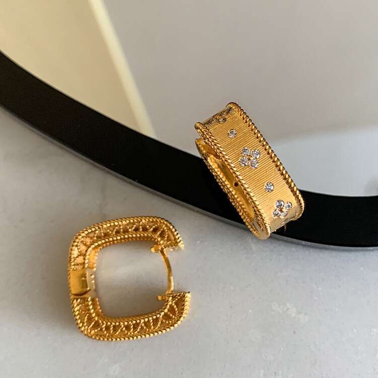 Earrings Designer Luxury jewelry for women earring Four leaf clover hollow pattern copper plated 18K gold Simple Fashion Festival Vacation gifts