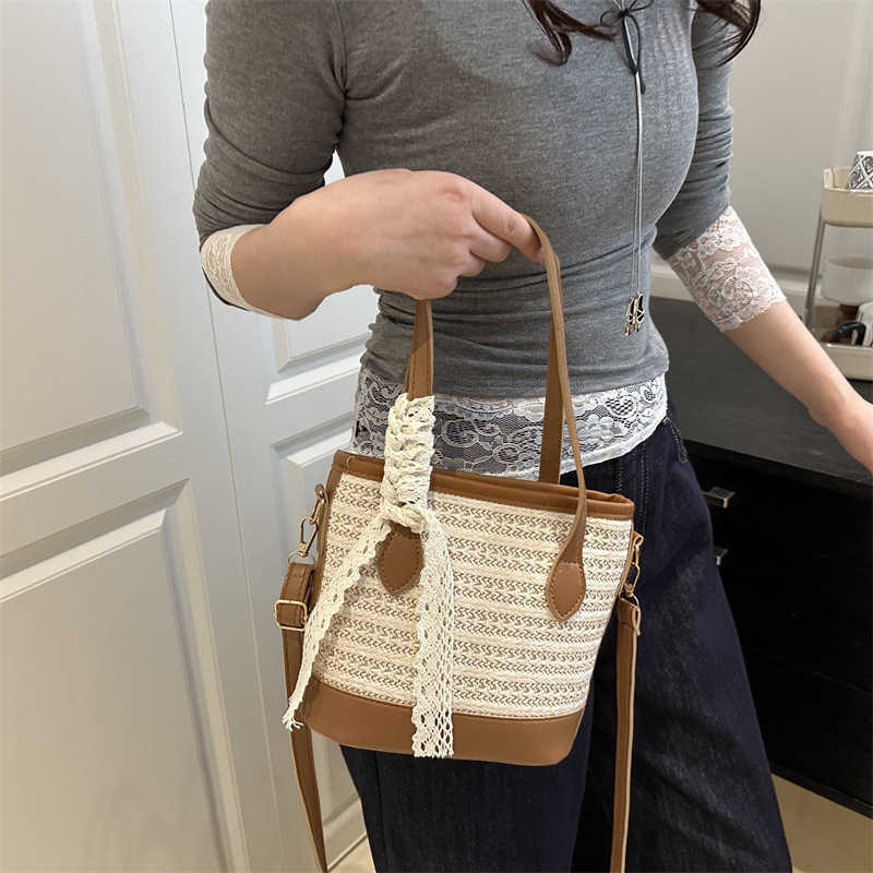 Silk Trendy Texture Woven 2025 Large Capacity New Straw Woven Womens Beach Crossbody Handheld Bucket Bag H251009