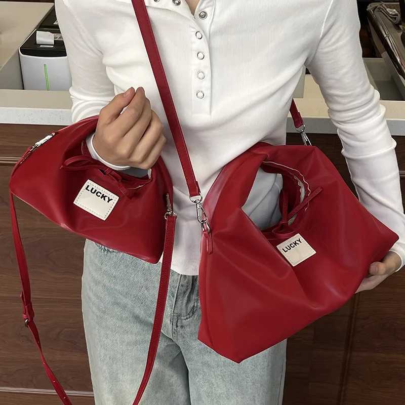 2025 New Wens Fi Forward Niche Dumpling Bag Soft Leather Texture Portable Versatile Cmuter Messenger Bag D251009