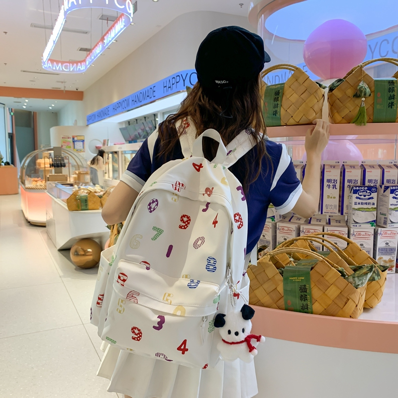 Schoolbag female high school college student junior high school campus Korean niche easy-matching ins canvas contrast color stripe backpack