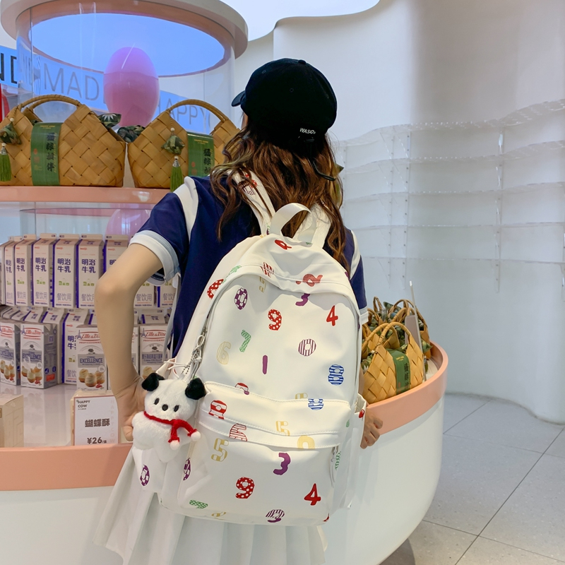 Schoolbag female high school college student junior high school campus Korean niche easy-matching ins canvas contrast color stripe backpack