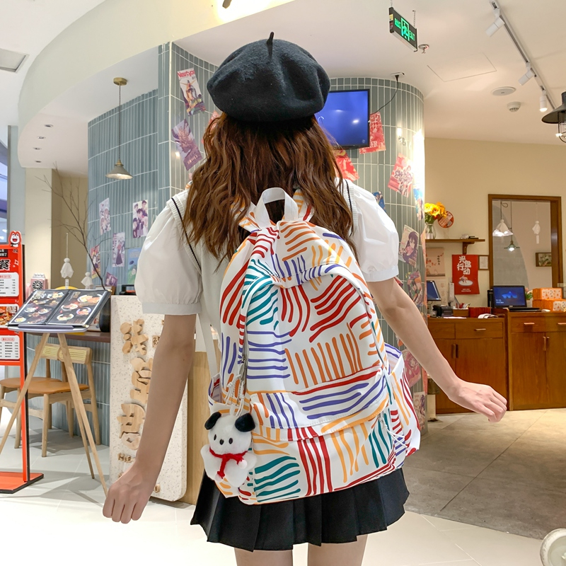 Schoolbag female high school college student junior high school campus Korean niche easy-matching ins canvas contrast color stripe backpack