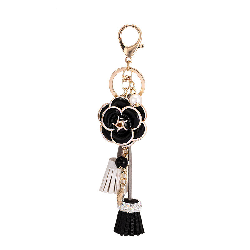 keychain Korean Version Light Luxury Pearl Chain Bag Pendant Camellia Leather Tassel Ornament Car Keychain Accessory bag charms Z260130