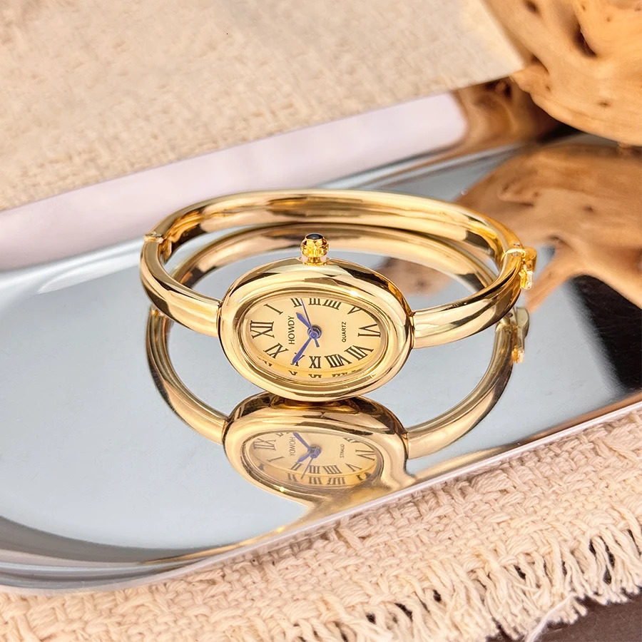 style bathtub bracelet small dial exquisite and unique light womens highend Roman numerals oval quartz watch 251008