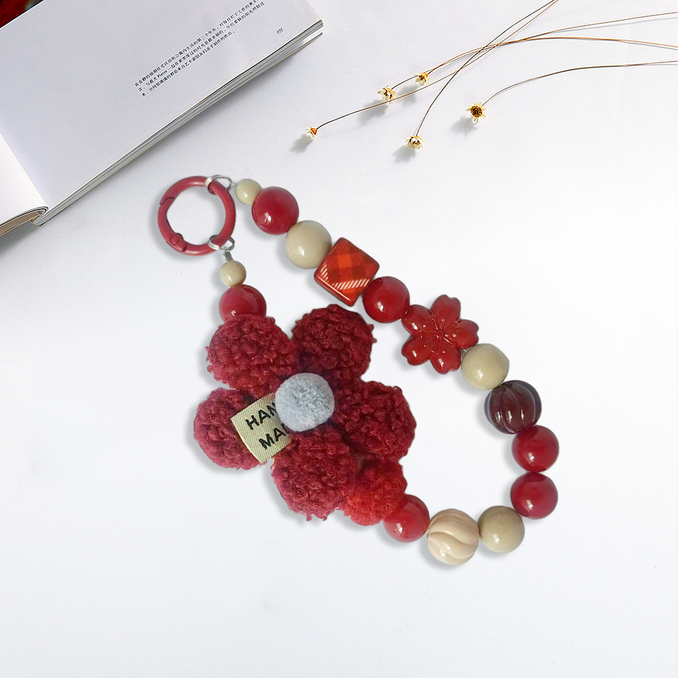 Plush flowers with red and white beads in a creative mix-and-match design. Multiple bead styles combine for a versatile. Anti-loss feature ensures eas