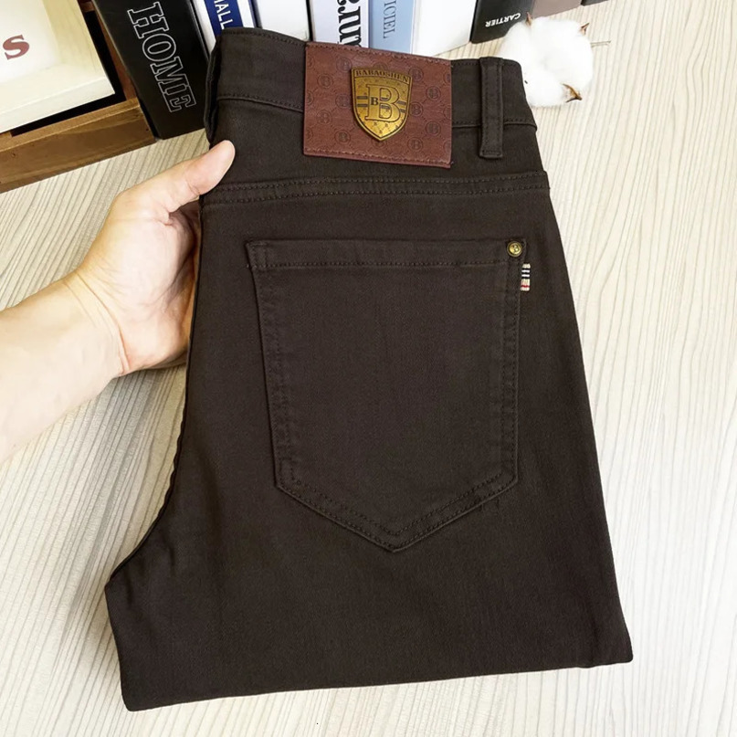 Mens coffee colored jeans simple and fashionable highend slim fit suitable for casual trendy business pants with small feet 241115