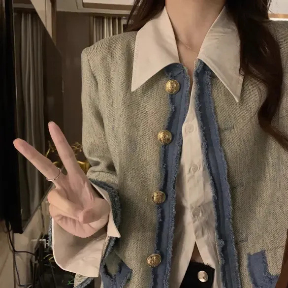 2025 autumn and winter designer luxury coat new color blocked patchwork coat fashion for women, high-end design sense, niche elegance, socialite versa