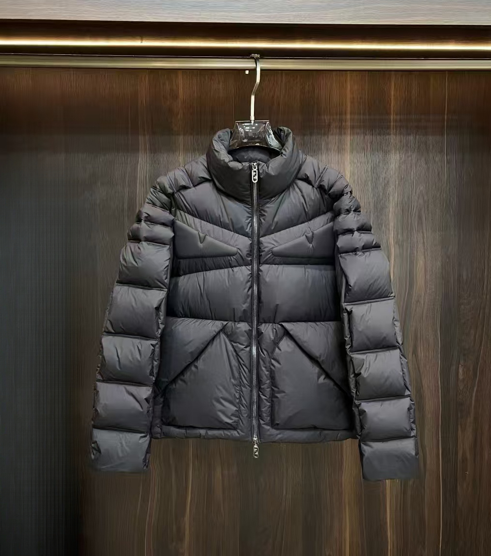 Designers latest fashion down jacket featuring classic Squirrel Eyes motif and Double FF logo with architectural cutting for versatile styling