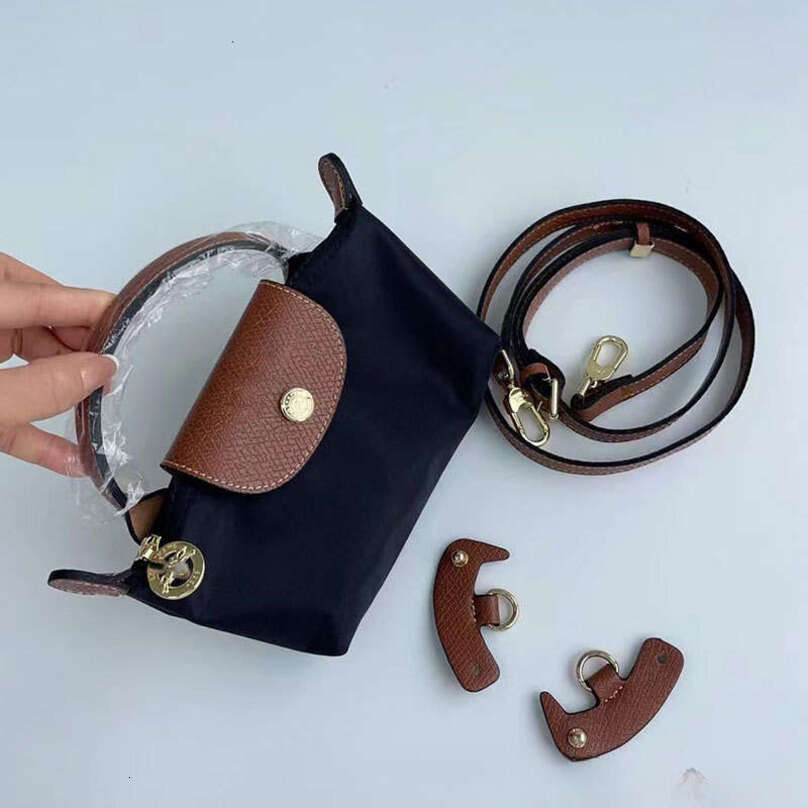 designer bag Luxury bag High-Quality Cowhide Handle Dumpling Crossbody Shoulder Phone Coin Purse Clutch Bag for Women Mini