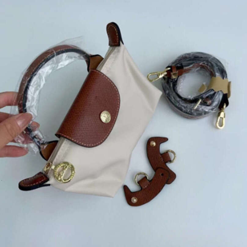 designer bag Luxury bag High-Quality Cowhide Handle Dumpling Crossbody Shoulder Phone Coin Purse Clutch Bag for Women Mini