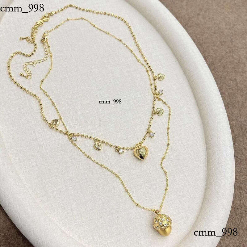 DHCollection Pinecone Heart Pattern Gold Plated Cubic Zirconia Ins Vintage Pendant Necklace Fashion Jewelry