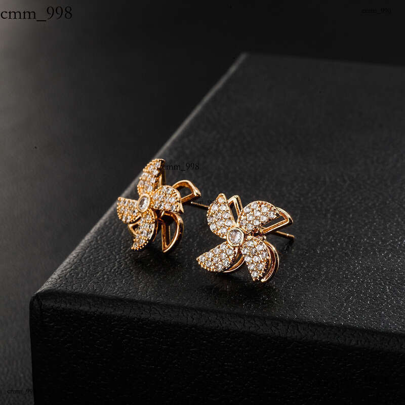 Sier Needle Inlaid Dia Rotating Windmill French Exquisite High-end Design Stud Earrings Elegant Ear Jewelry