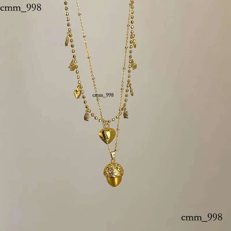 DHCollection Pinecone Heart Pattern Gold Plated Cubic Zirconia Ins Vintage Pendant Necklace Fashion Jewelry