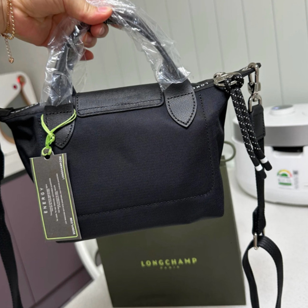 5a French Longchamp Mini Dumpling Commute Versatile Crossbody Handbag Womens Small Bag with Perforated Shoulder Strap Large Shopping Bag Portable Shopping Long