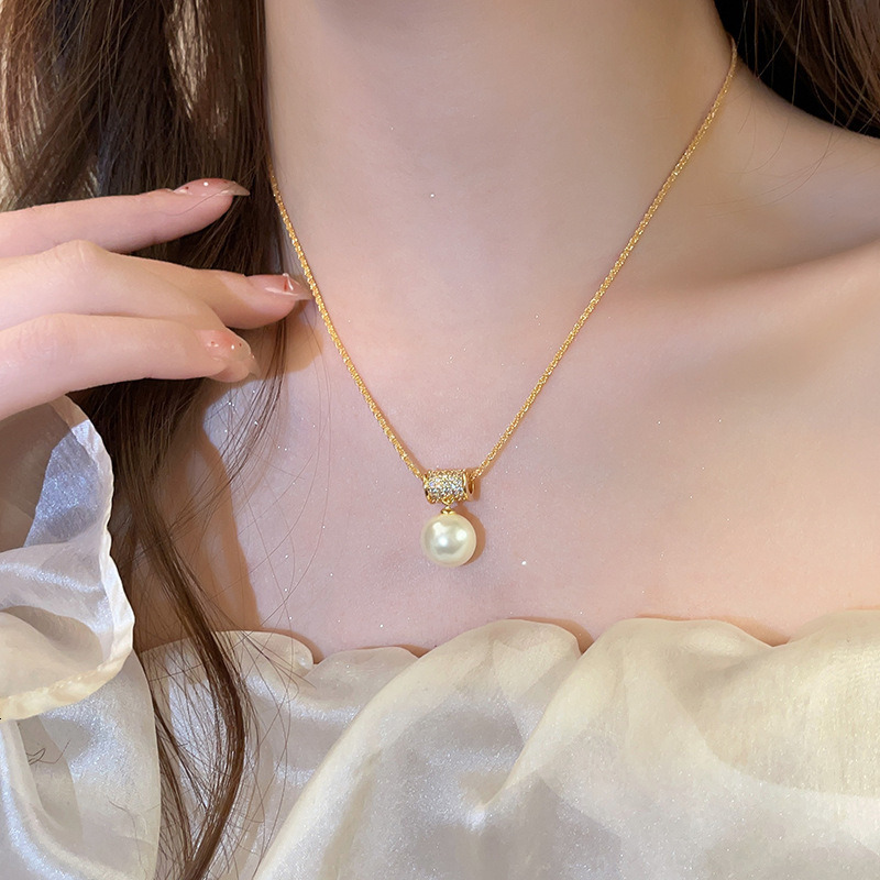 French golden waist full diamond Imitation pearl necklace with feminine charm, exquisite and niche design, high-end sweater chain accessory