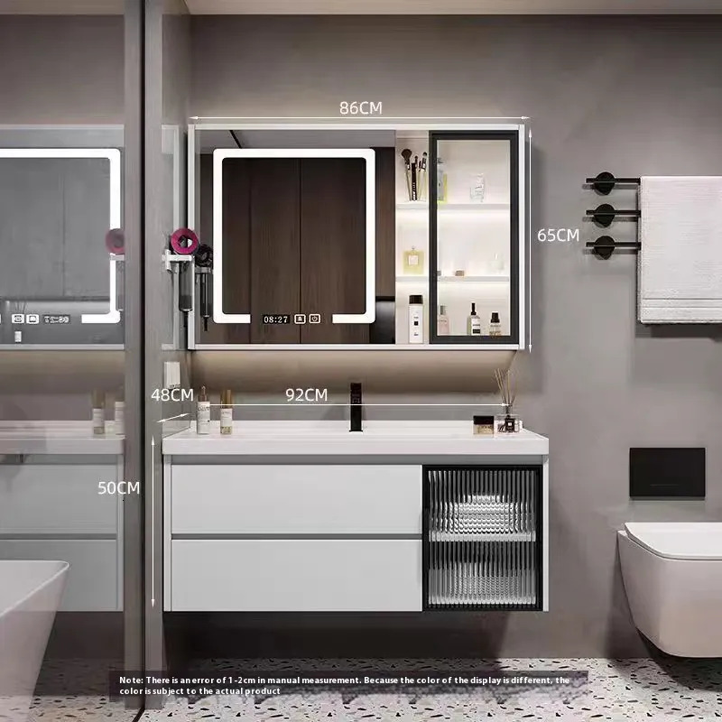 Modern minimalist bathroom cabinet with intelligent toilet ceramic integrated basin washbasin vanity set for face washing and hand washing.