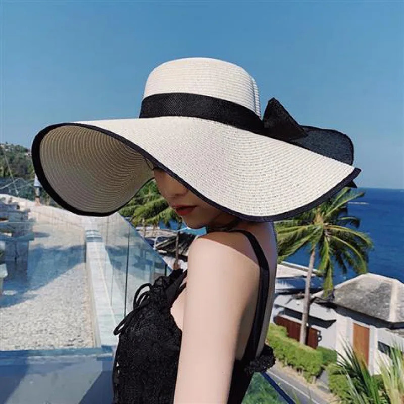 15CM Wide Brim Beach Straw Hats For Women Simple Foldable Summer Outing Sun Hat Fashion Flat Brom Bowknot Uv Protection Panama 251013