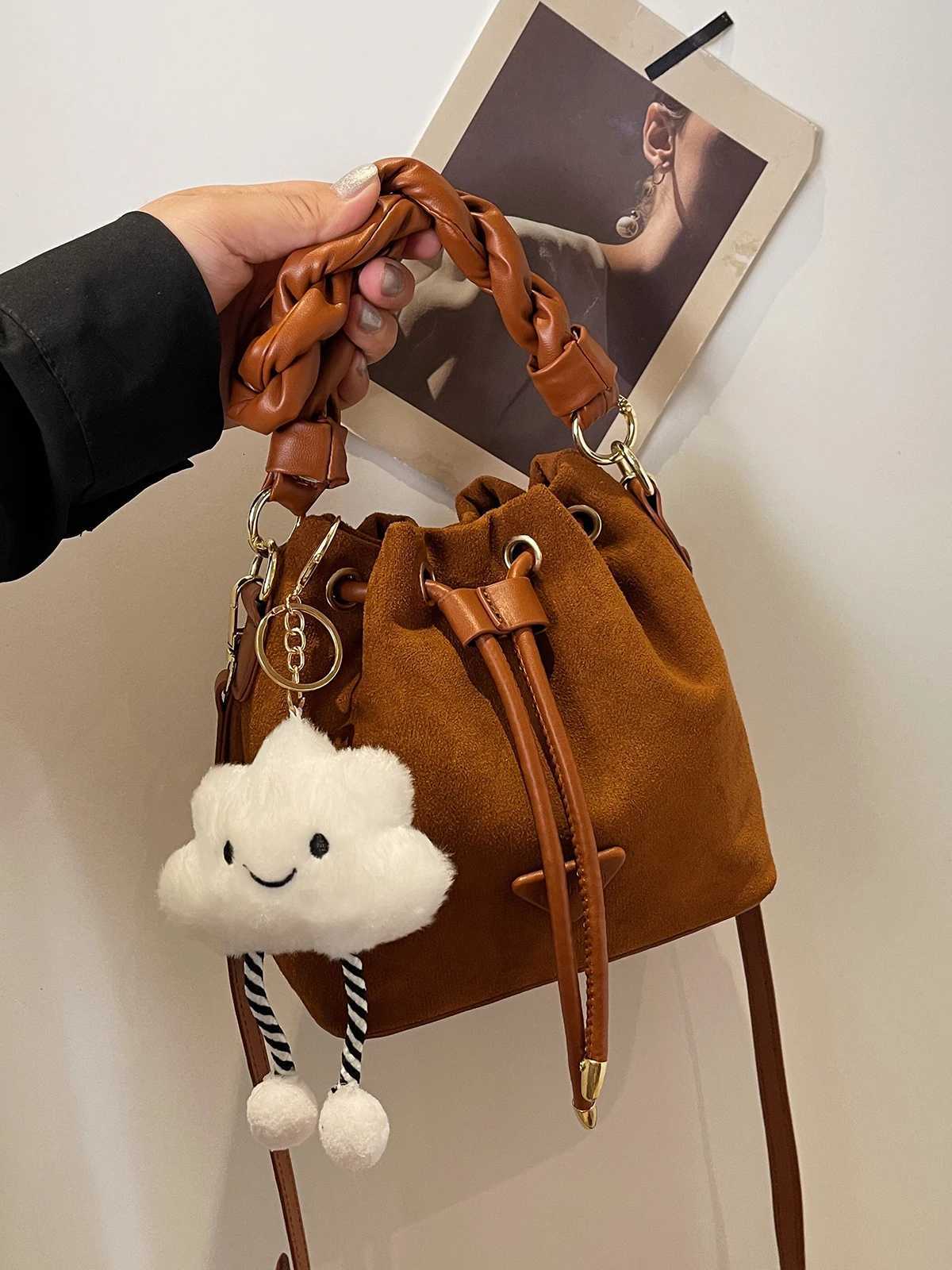 Niche design suede bag wen 2024 new autumnwinter messenger bag pleated bucket bag D251014