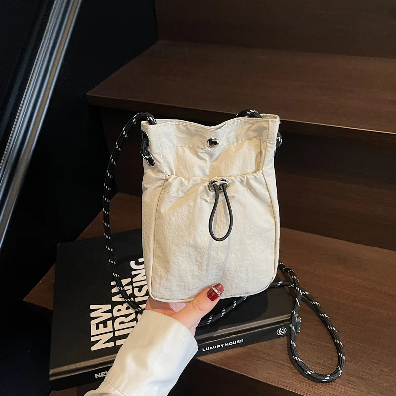 Minimalist Style Lightweight Drawstring Canvas Small Bag Versatile Mini SingleShoulder Crossbody Coin Purse for Mobile Phones 251014