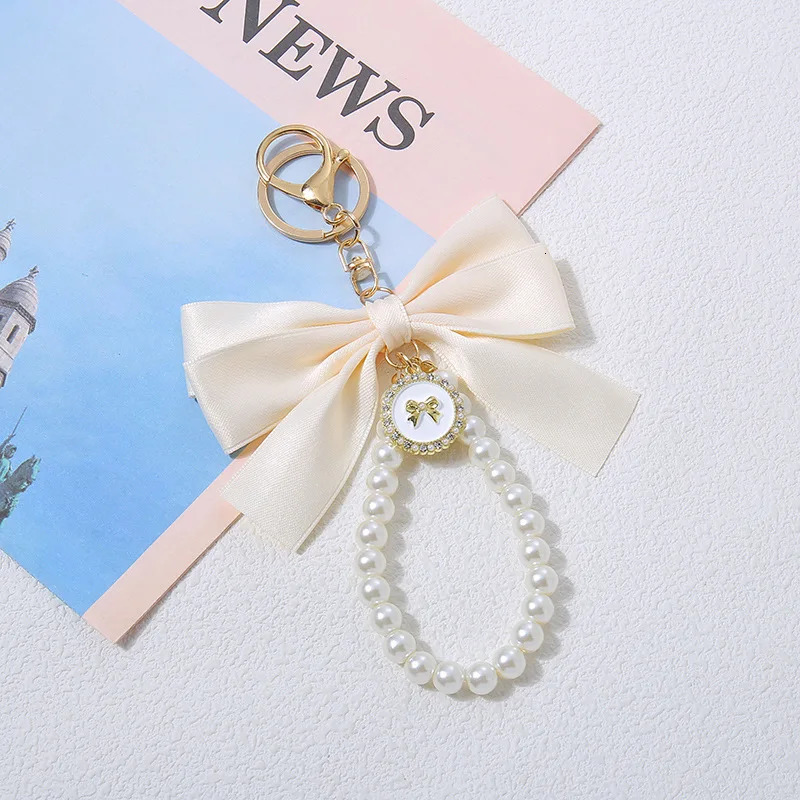 Keychain with bow Large tieCarrying bag for hangingOrnamentBag decorationsDIY headphone caseAccessories 251013