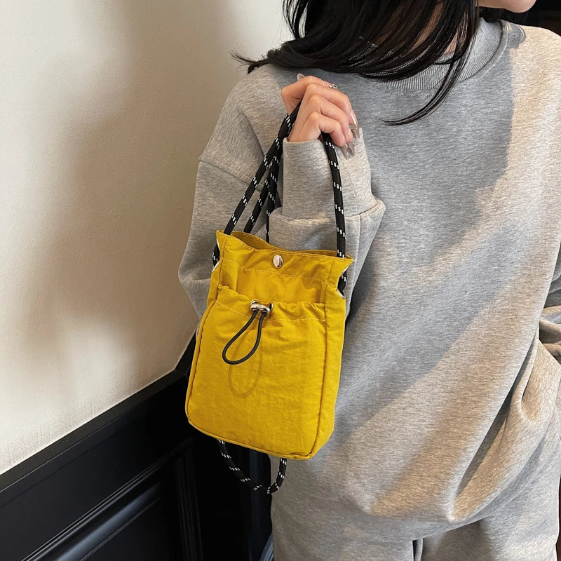 Minimalist Style Lightweight Drawstring Canvas Small Bag Versatile Mini SingleShoulder Crossbody Coin Purse for Mobile Phones 251014