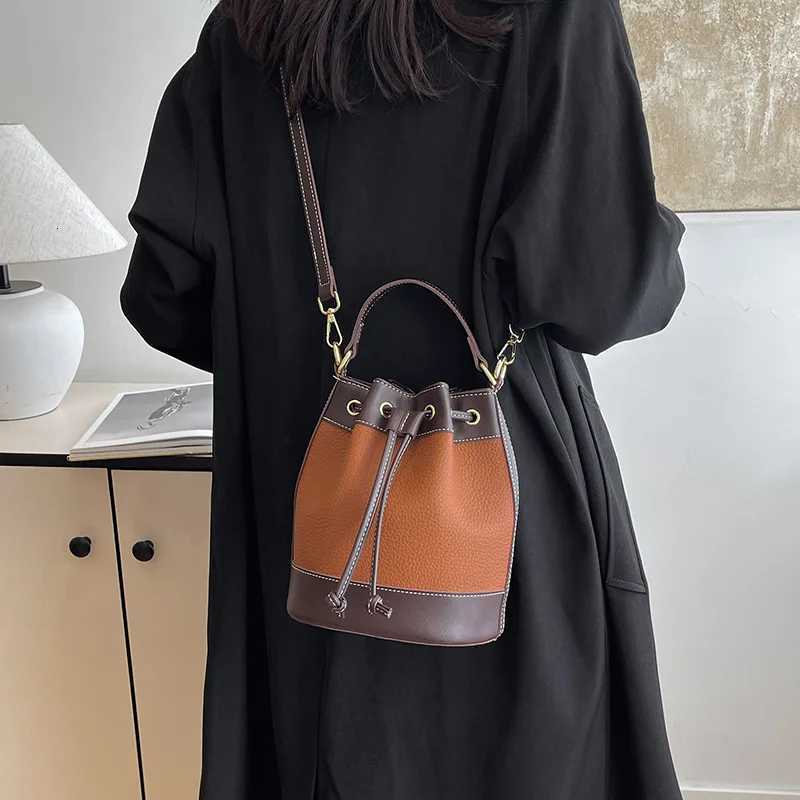 Popar niche design shoder bag 2025 new wens bag color blocked drstring crossbody bag cmuting handheld bucket bag D251014