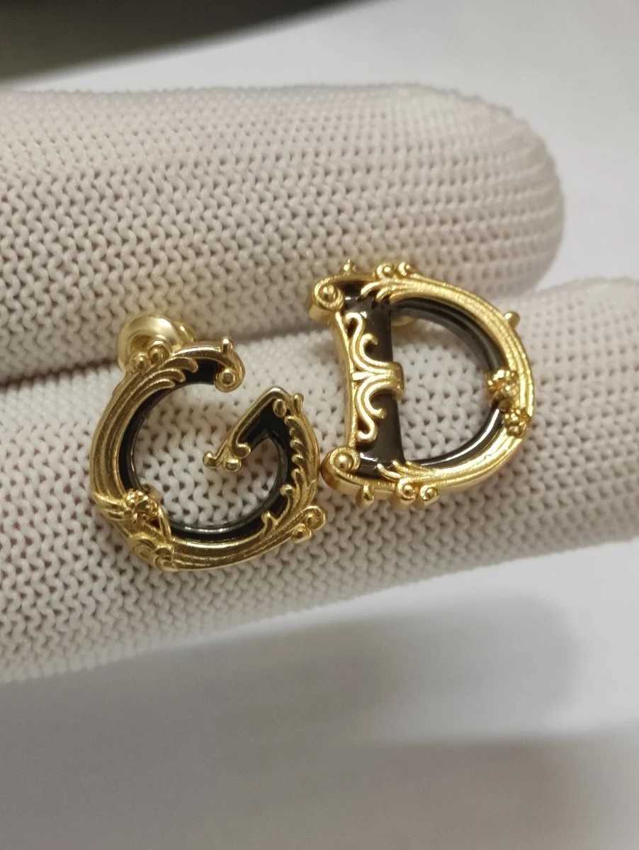 Stylish retro palatial style goldplated earrings Light luxury elegant DG letters highgrade sense pearl studs J251013