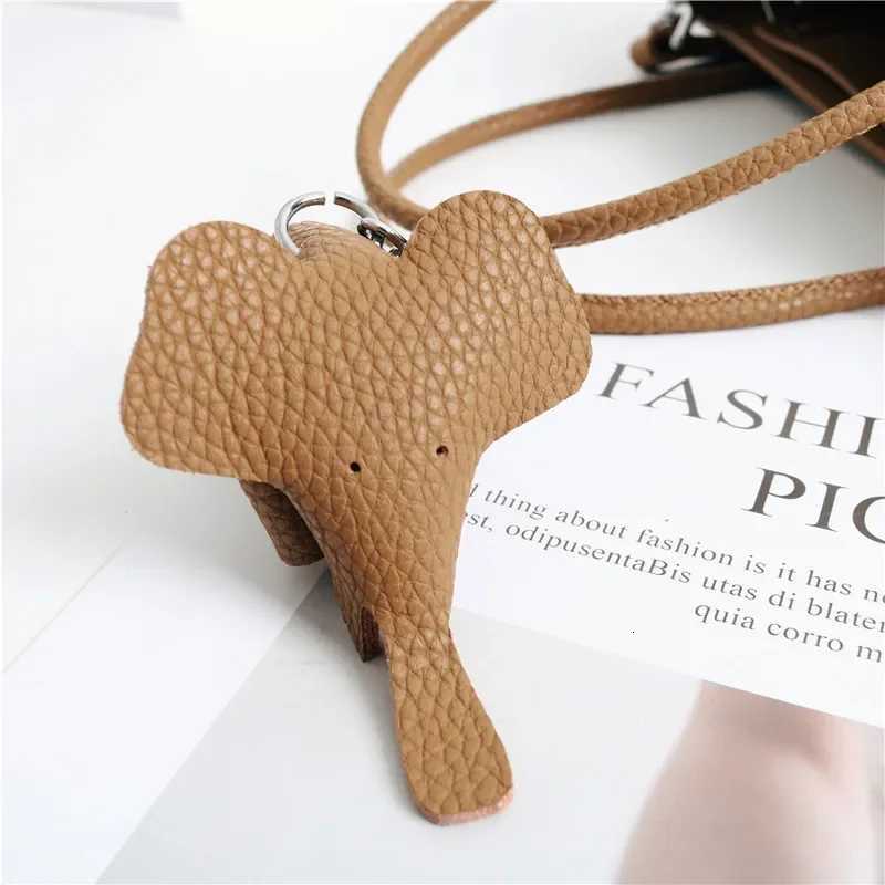 2024 Most Popar Togo Cowhide Leather Bucket Bag Small Neat Allmah Elegant Wen Shoder Bag with Elephant Ornaments D251014