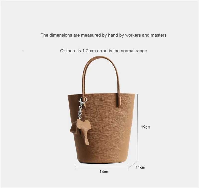 2024 Most Popar Togo Cowhide Leather Bucket Bag Small Neat Allmah Elegant Wen Shoder Bag with Elephant Ornaments D251014
