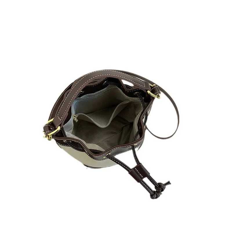 Popar niche design shoder bag 2025 new wens bag color blocked drstring crossbody bag cmuting handheld bucket bag D251014