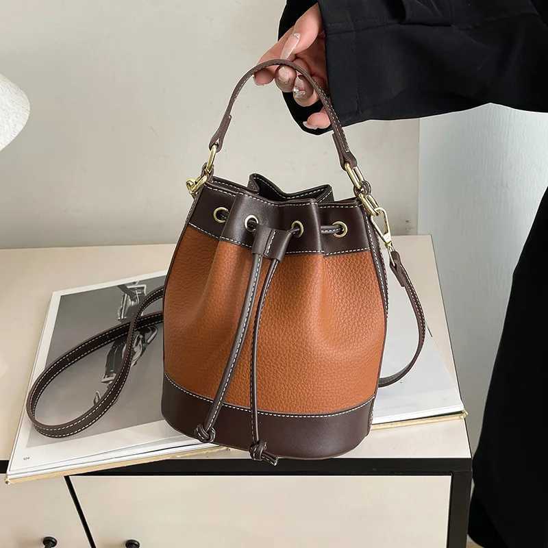 Popar niche design shoder bag 2025 new wens bag color blocked drstring crossbody bag cmuting handheld bucket bag D251014