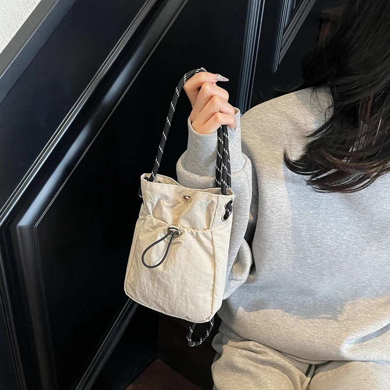 Minimalist Style Lightweight Drawstring Canvas Small Bag Versatile Mini SingleShoulder Crossbody Coin Purse for Mobile Phones 251014