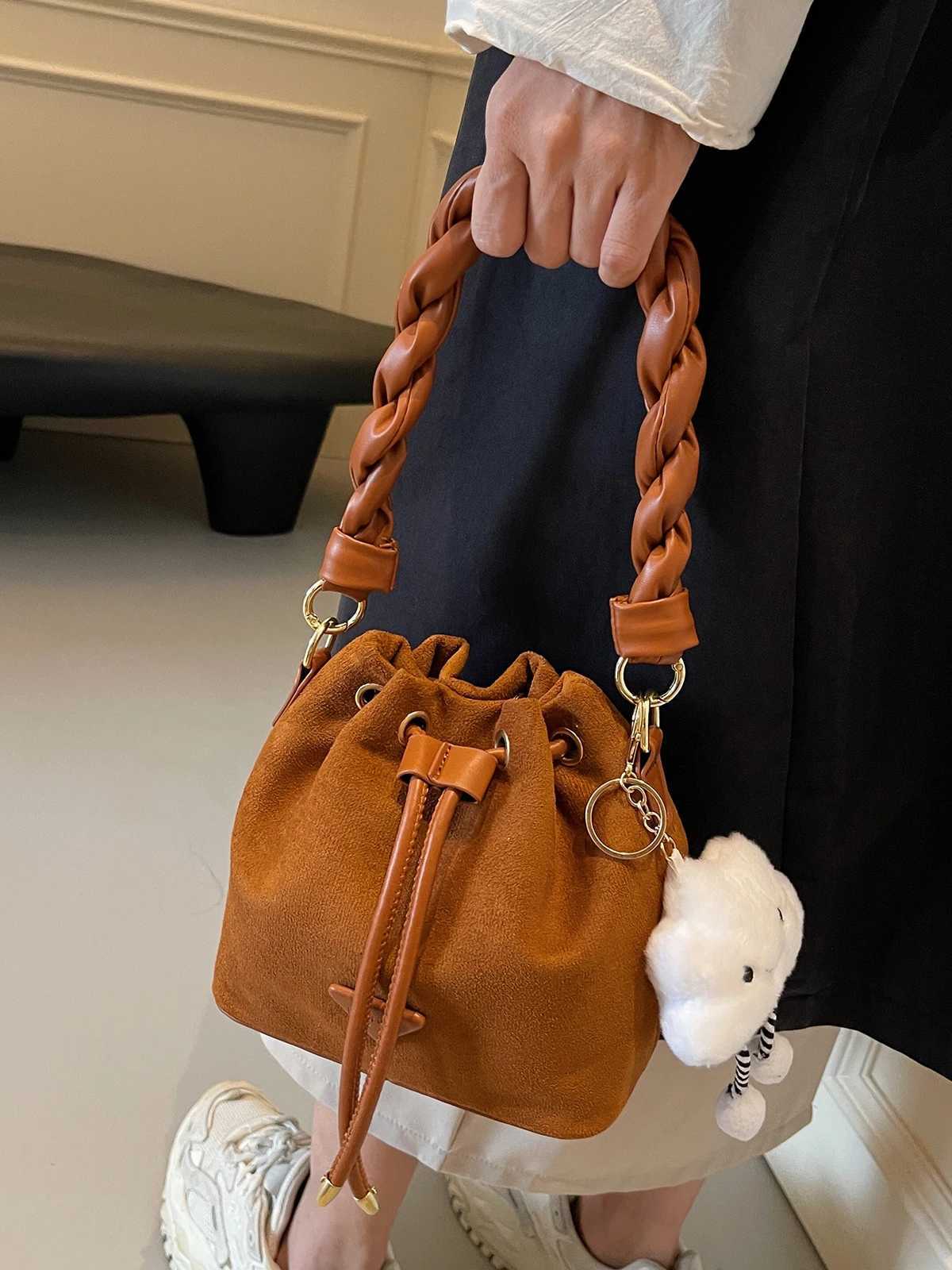 Niche design suede bag wen 2024 new autumnwinter messenger bag pleated bucket bag D251014