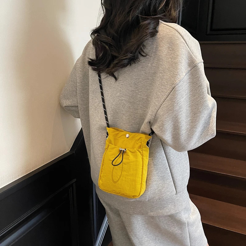 Minimalist Style Lightweight Drawstring Canvas Small Bag Versatile Mini SingleShoulder Crossbody Coin Purse for Mobile Phones 251014