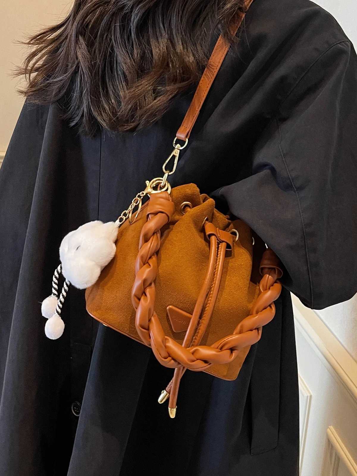 Niche design suede bag wen 2024 new autumnwinter messenger bag pleated bucket bag D251014