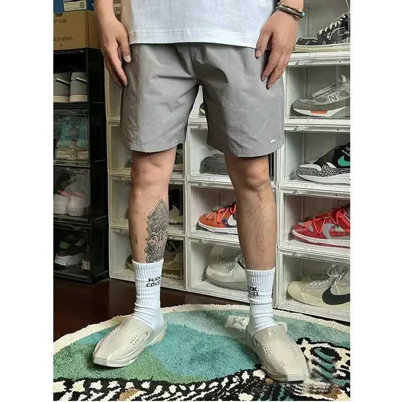 JJJJOUND joint nylon solid color classic quickdrying shorts drawstring loose sports beach pants men and women couple trendT251015