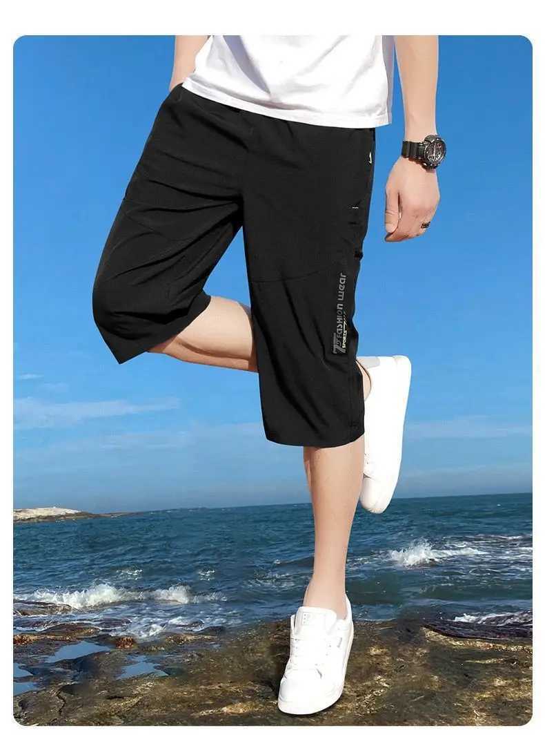 Mens work pants knee length pants zippered pockets summer shorts hiking and jogging elastic waist sportswearT251015