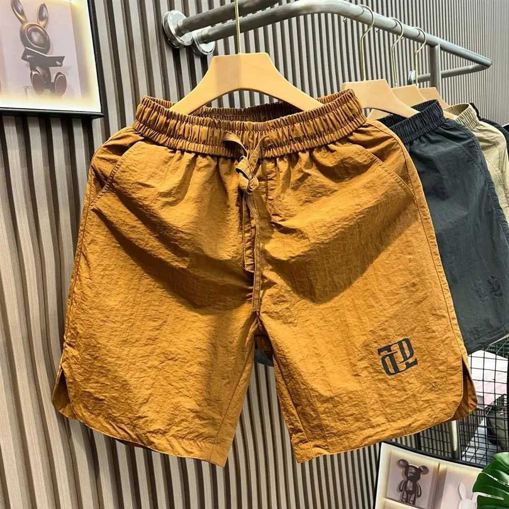 Summer Thin Ice Silk Qui Dry Casual orts Breathable Beach Pants Loose Sports Outdoor FiveQuarter Large orts for MenT251015
